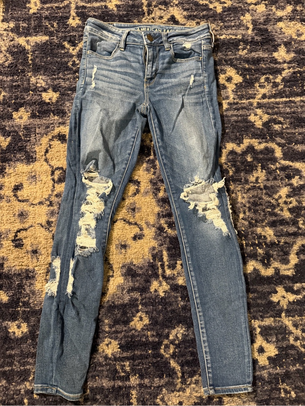 American Eagle Outfitters Medium Blue Ripped Skinny Jeans